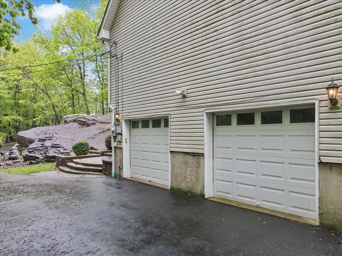 2330 Burntwood Drive East Stroudsburg, PA 18301 - Photo 42 of 44 a view of a house with a garage