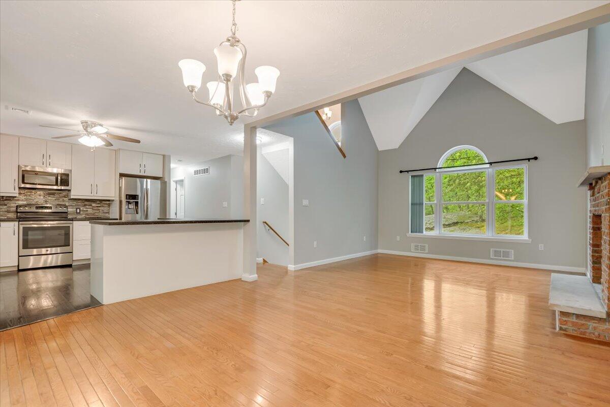 2330 Burntwood Drive East Stroudsburg, PA 18301 - Photo 5 of 44 a view of a kitchen with wooden floor and a kitchen