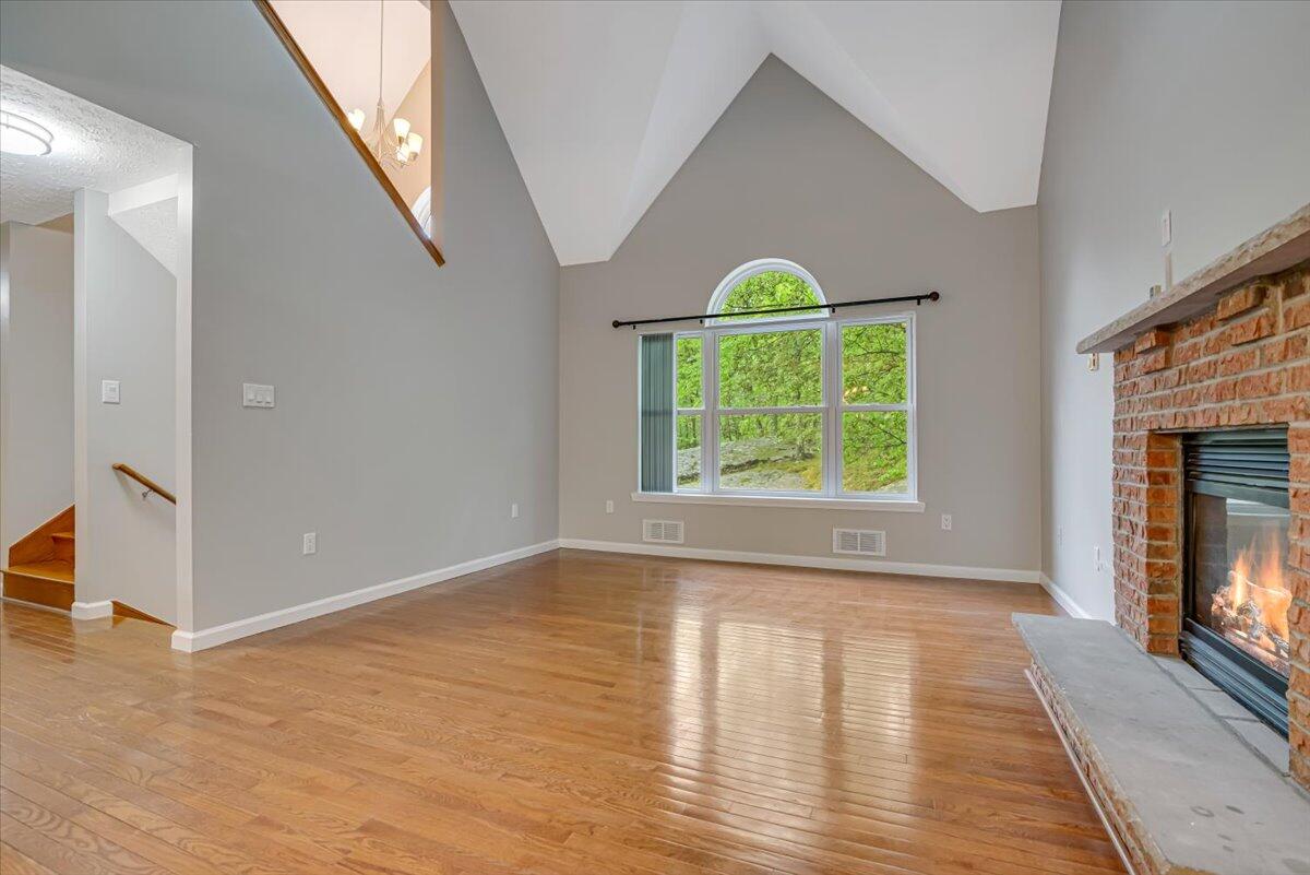 2330 Burntwood Drive East Stroudsburg, PA 18301 - Photo 7 of 44 an empty room with windows and fireplace
