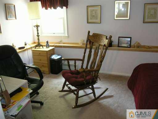630 Myrtle Road North Brunswick, NJ 08902 - Photo 6 of 8 a view of a workspace with furniture and a window