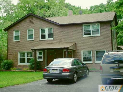 630 Myrtle Road North Brunswick, NJ 08902 - Photo 8 of 8 a car parked in front of a house