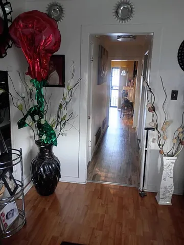 a vase of flowers sitting on a table