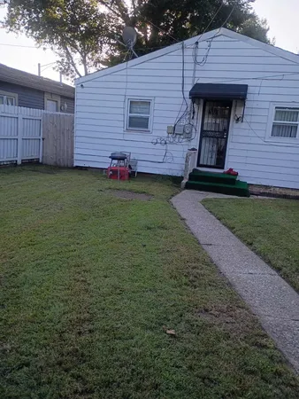 a view of a house with a garden