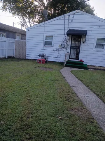 a view of a house with a garden