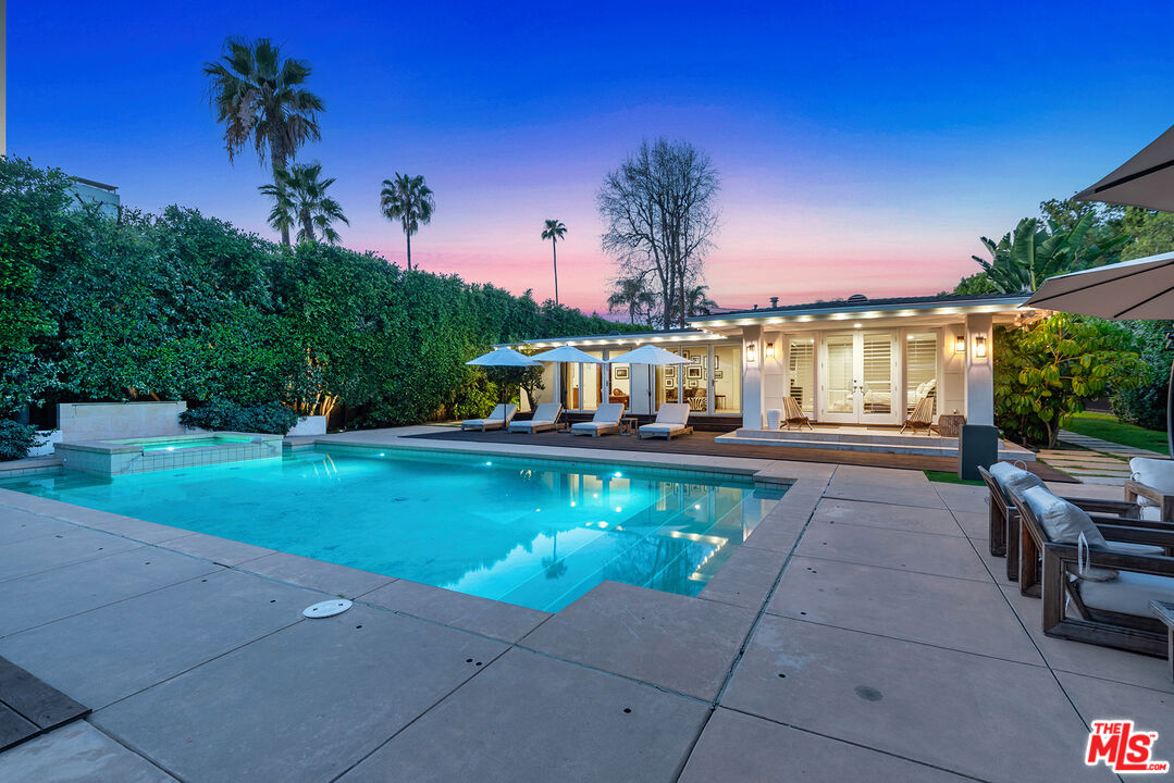 10424 Valley Spring Lane Toluca Lake, CA 91602 - Photo 30 of 44 a view of a house with a yard balcony