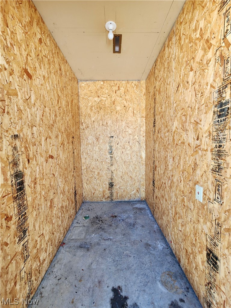 1873 Highway 6, Unit A1 Rome, OH 44085 - Photo 28 of 29 Storage room off the left side of the unit.