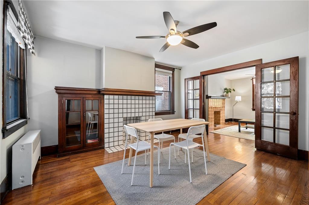219 Main Street Pittsburgh, PA 15201 - Photo 25 of 35 a view of a dining room with furniture window and wooden floor