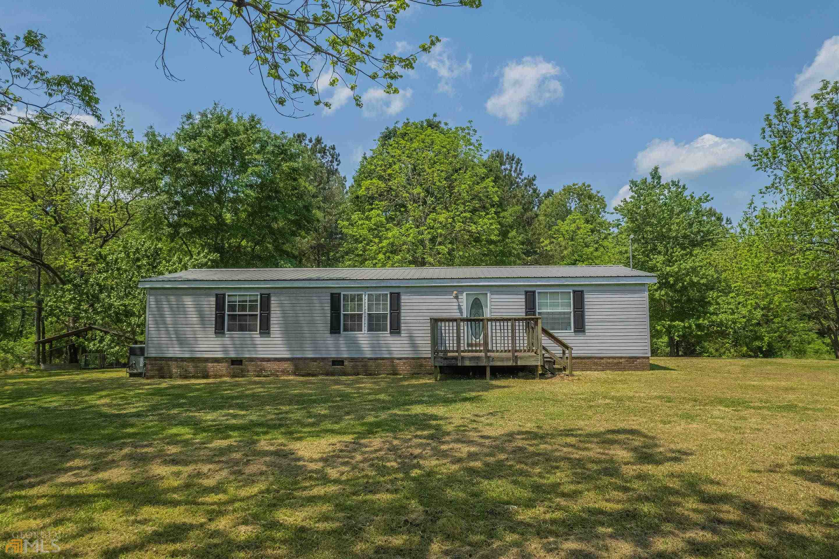 6506 Mize Road Toccoa, GA 30577 - Photo 1 of 1 a house with yard in front of it
