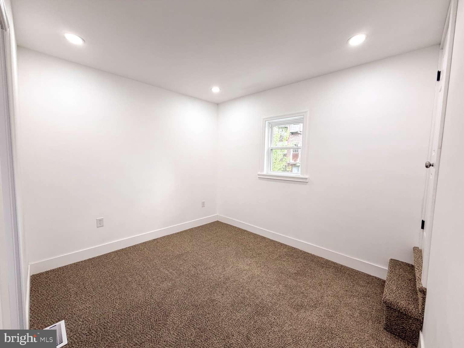 1050 Culvert Street Reading, PA 19602 - Photo 13 of 17 an empty room with a window