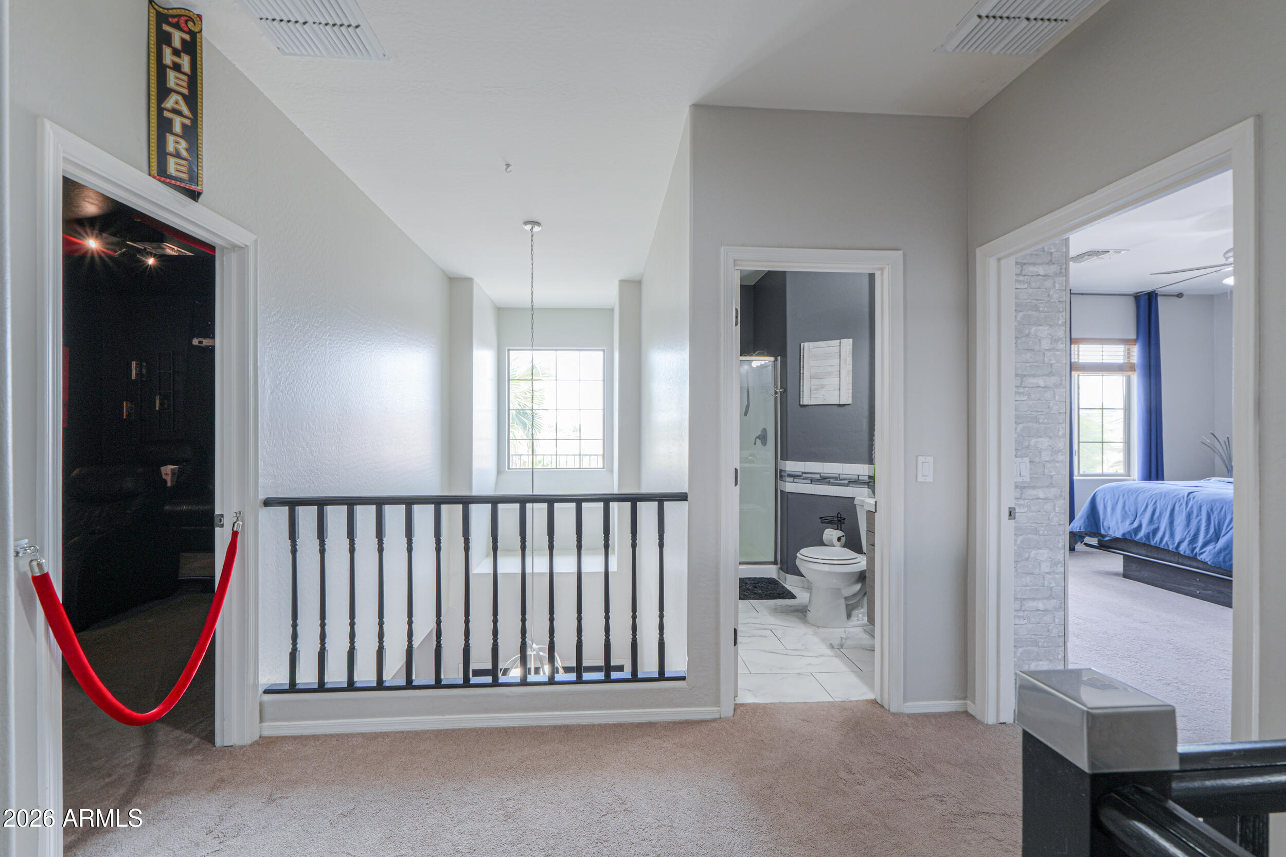 45247 West Jack Rabbit Trail Maricopa, AZ 85139 - Photo 42 of 75 a view of a hallway with painted walls and stairs
