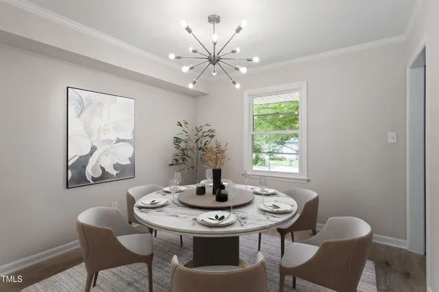 a view of a dining room with furniture window and outside view