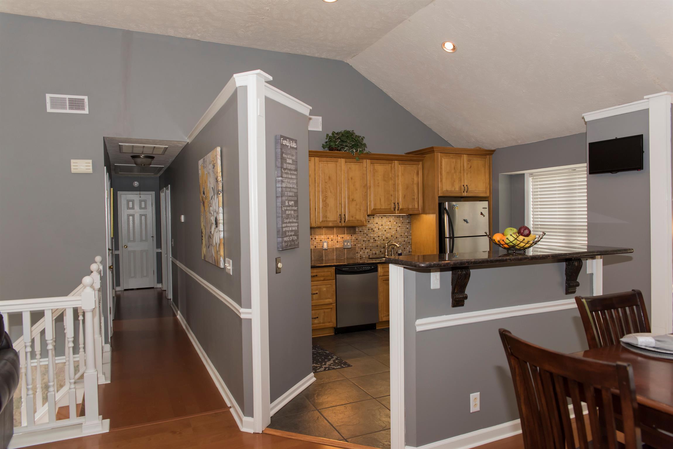 6233 Mt View Road Antioch, TN 37013 - Photo 3 of 29 At the top of the landing, left down the hall, right living room with open dining room and kitchen