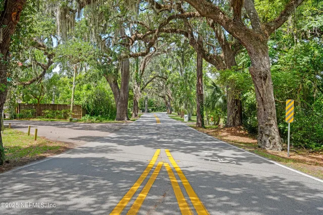 a view of yard with swimming pool