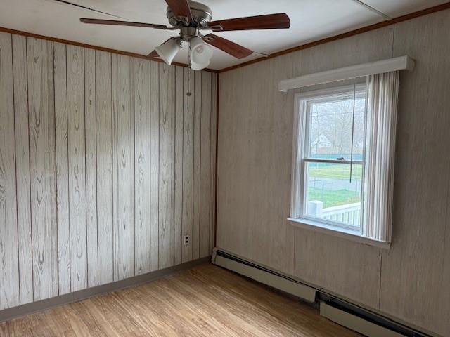 128 Maywood Road Mastic Beach, NY 11951 - Photo 9 of 11 a view of an empty room with a window and a chandelier fan