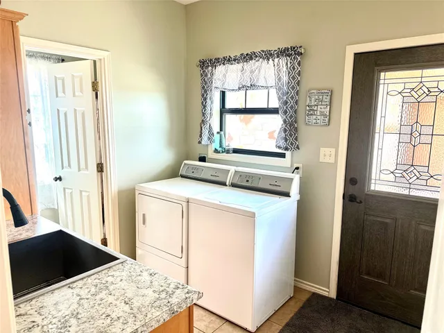 a view of a golf course with a lake view