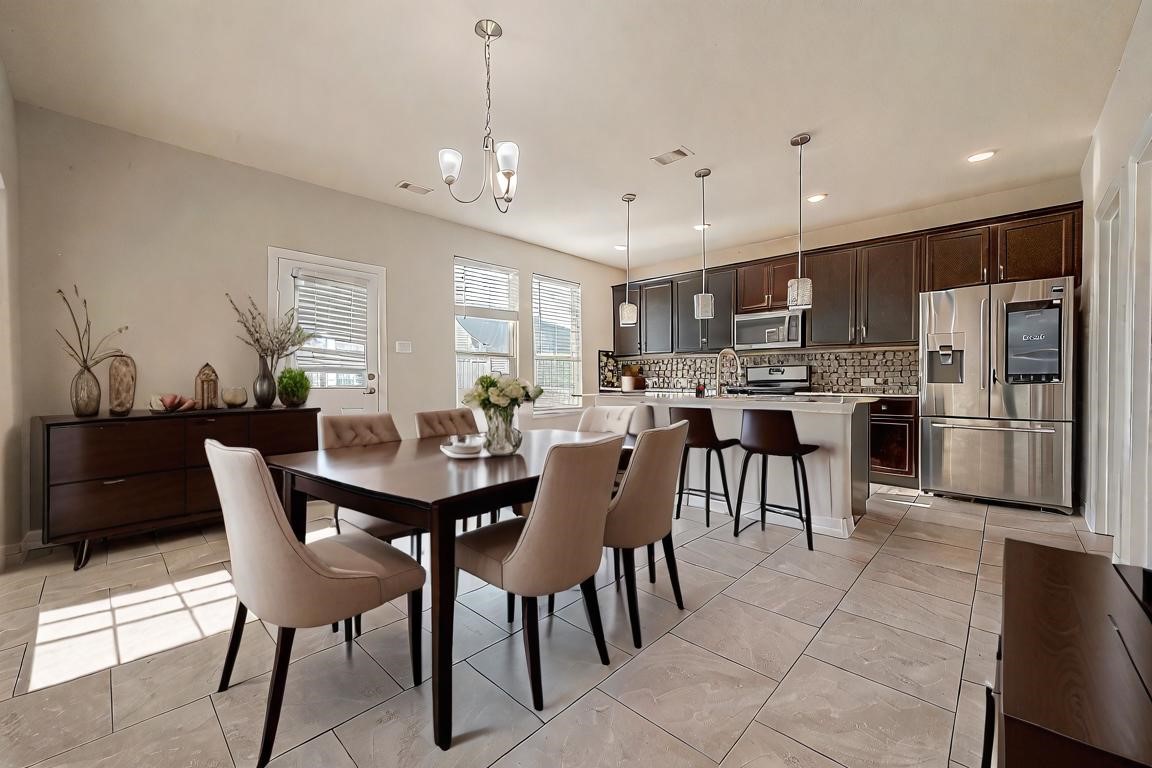 223 Sintra Lk Way Rosenberg, TX 77469 - Photo 9 of 45 Virtually Staged Dinning Room