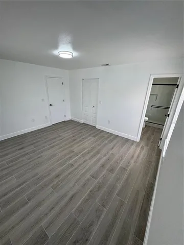 a view of a room with racks on the wall