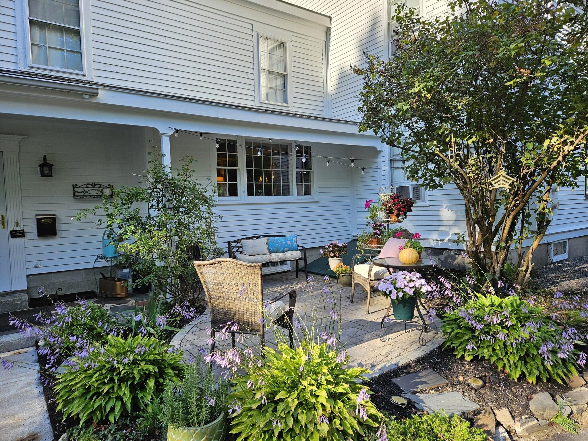 91 South Street Gorham, ME 04038 - Photo 13 of 17 11_PineCrest side patio during day