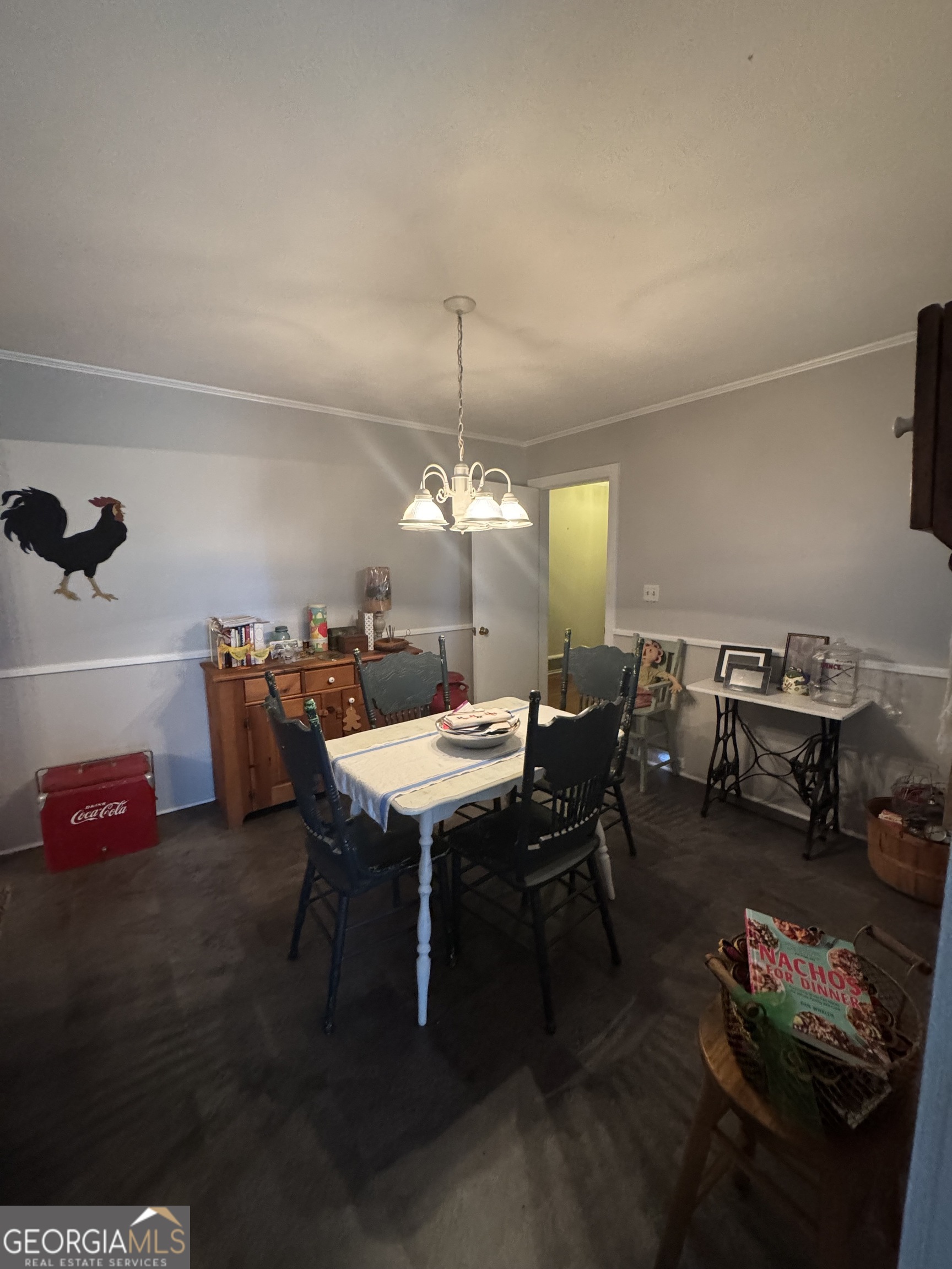 255 Highway 27 Georgetown, GA 39854 - Photo 12 of 16 a view of a dining room with furniture and wooden floor
