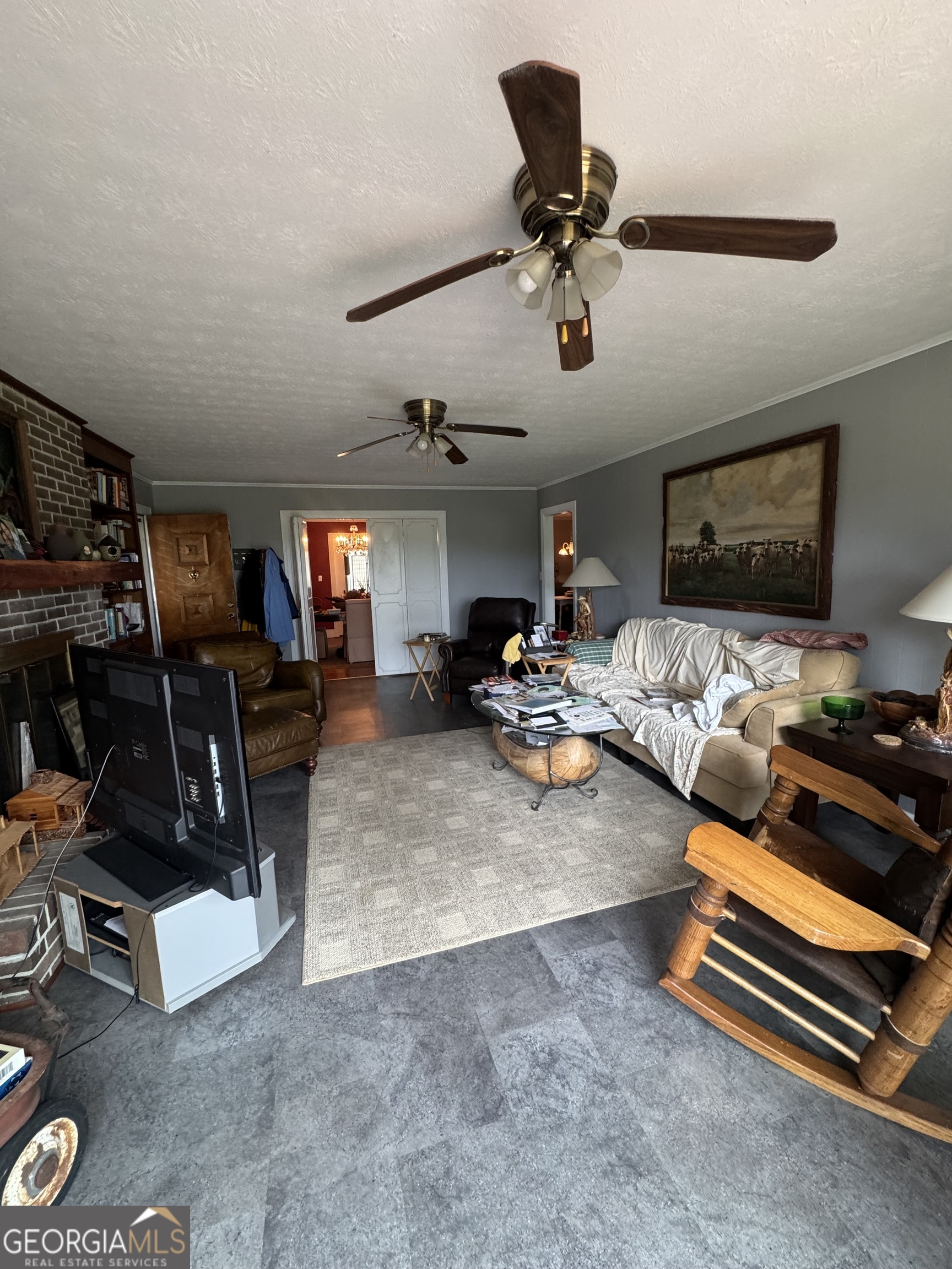255 Highway 27 Georgetown, GA 39854 - Photo 16 of 16 a living room with furniture and a flat screen tv