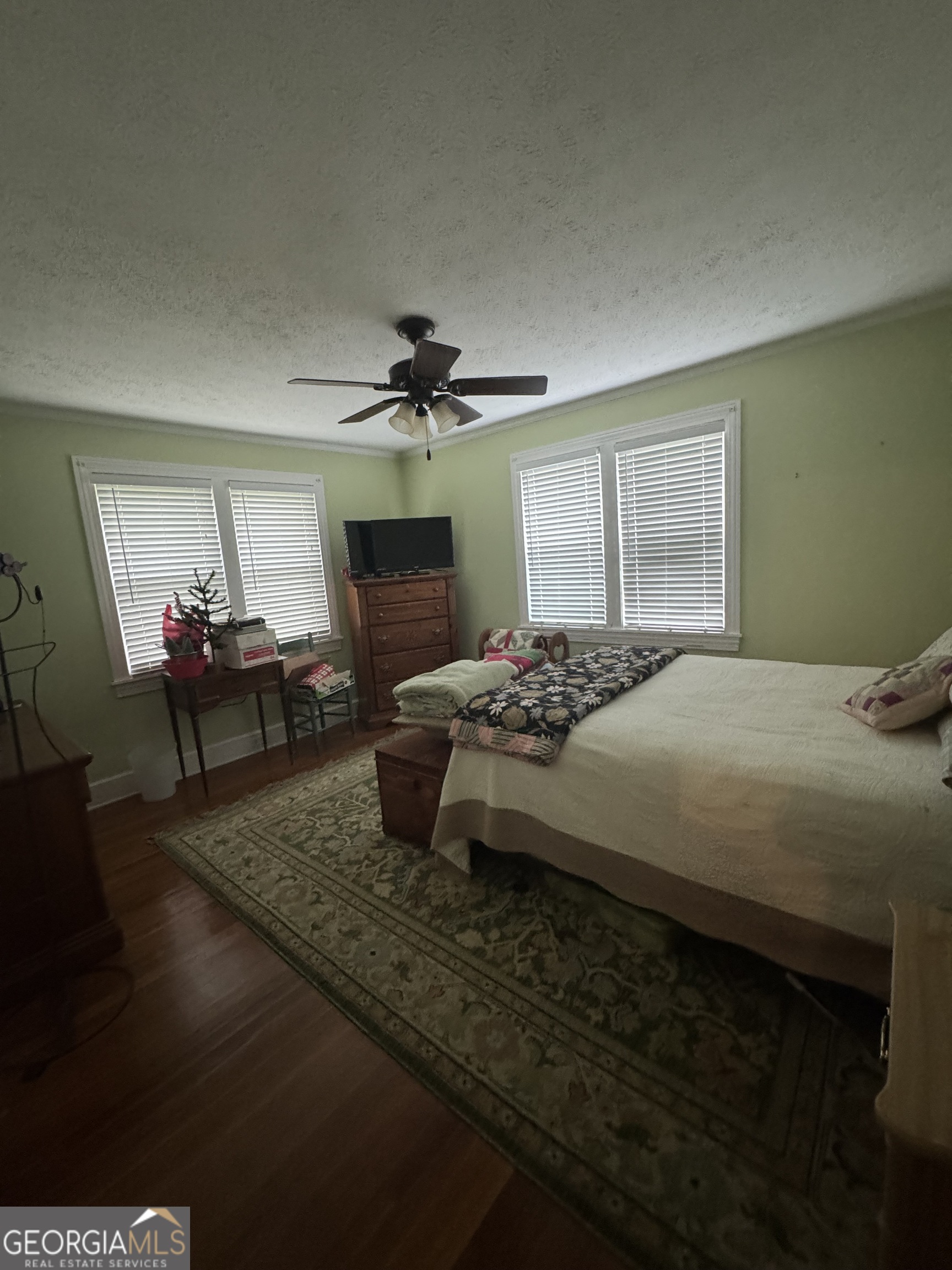 255 Highway 27 Georgetown, GA 39854 - Photo 4 of 16 a bedroom with a bed and a mirror