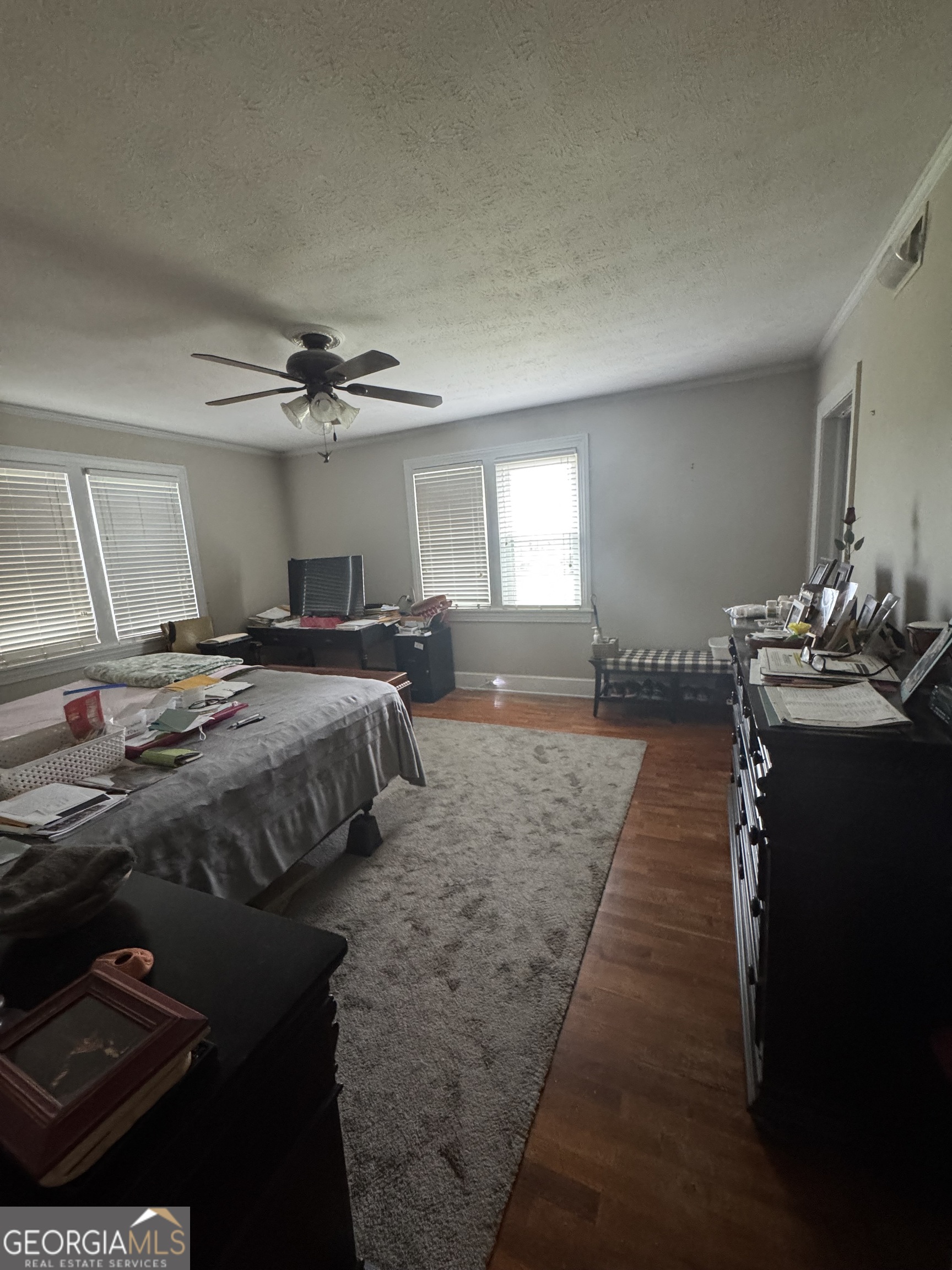 255 Highway 27 Georgetown, GA 39854 - Photo 7 of 16 a bedroom with double bed and a couch