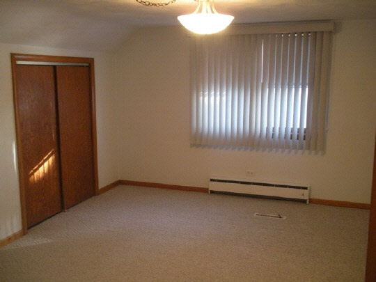 3233 Stone Quarry Road Belvidere, IL 61008 - Photo 8 of 11 an empty room with windows