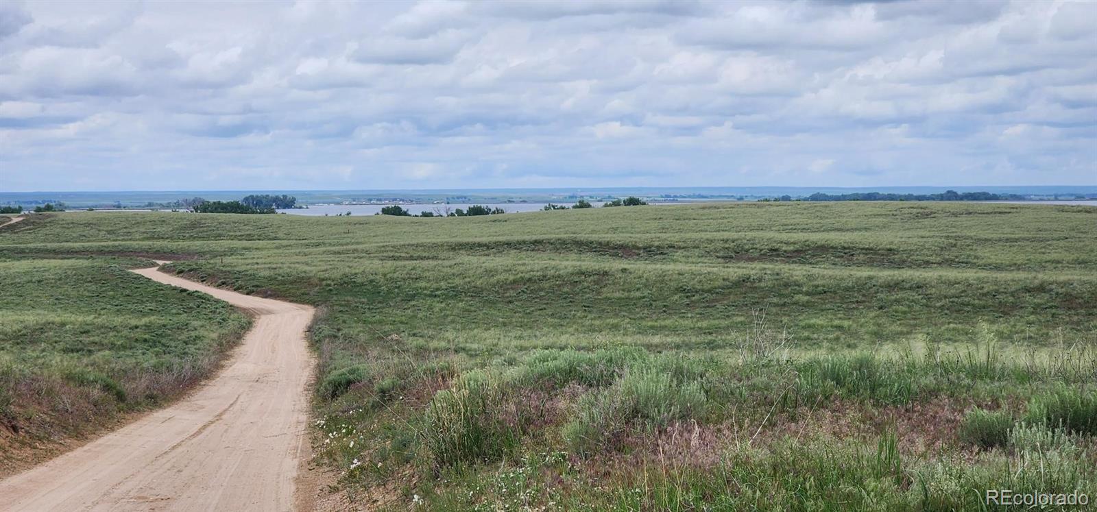 95 County Road South Orchard, CO 80649 - Photo 19 of 25 a view of a field with an ocean