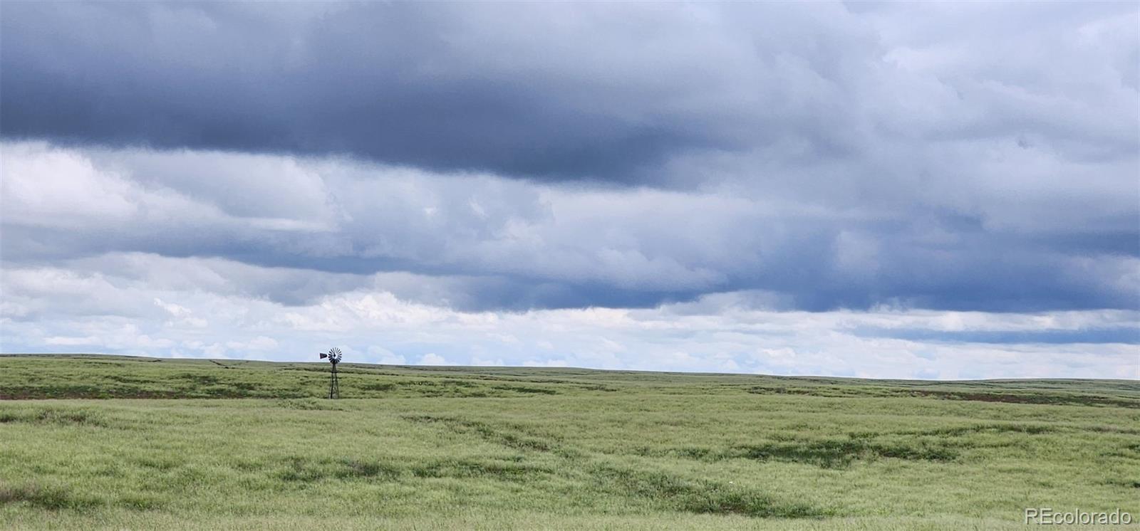 95 County Road South Orchard, CO 80649 - Photo 21 of 25 a view of a big room of a house with a big yard