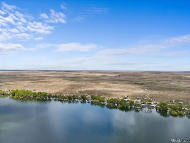 a view of an ocean and city