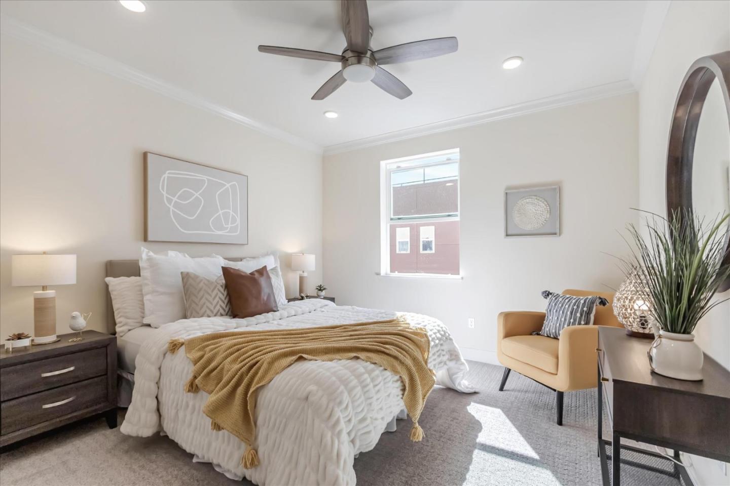 1653 Centre Pointe Drive Milpitas, CA 95035 - Photo 16 of 40 a bedroom with a bed and a potted plant