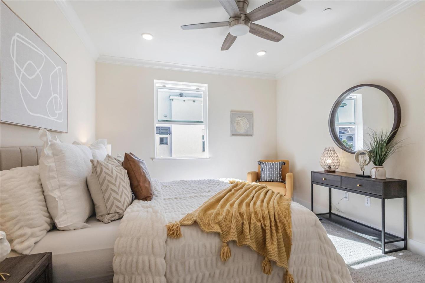1653 Centre Pointe Drive Milpitas, CA 95035 - Photo 17 of 40 a bedroom with a bed and a chandelier