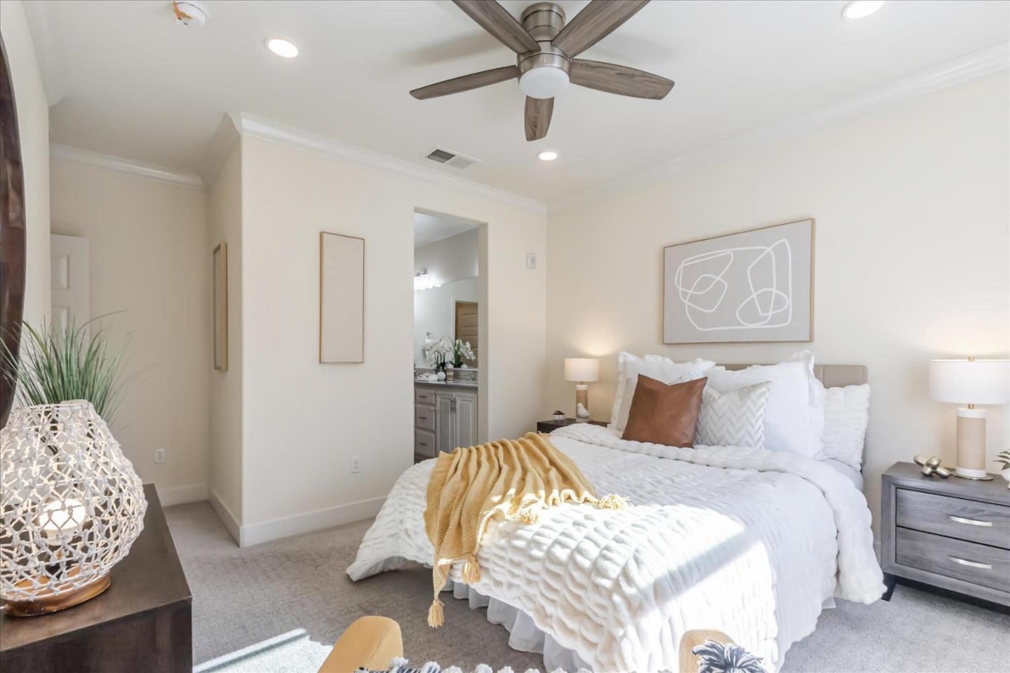 1653 Centre Pointe Drive Milpitas, CA 95035 - Photo 18 of 40 a bedroom with a bed and a chandelier
