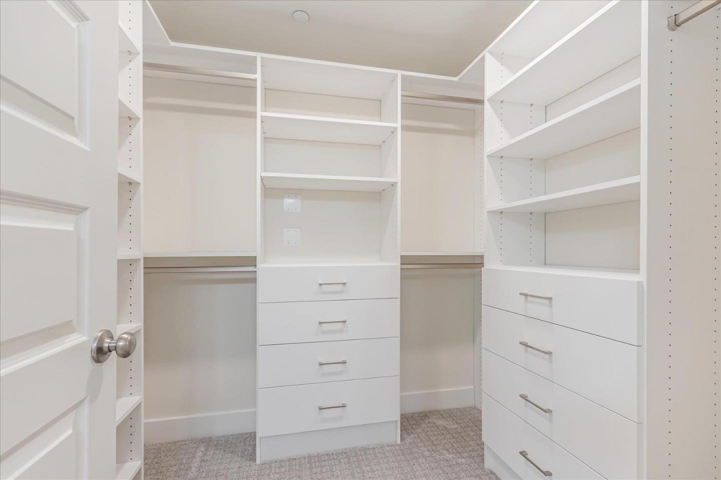 1653 Centre Pointe Drive Milpitas, CA 95035 - Photo 20 of 40 a view of an empty walk in closet