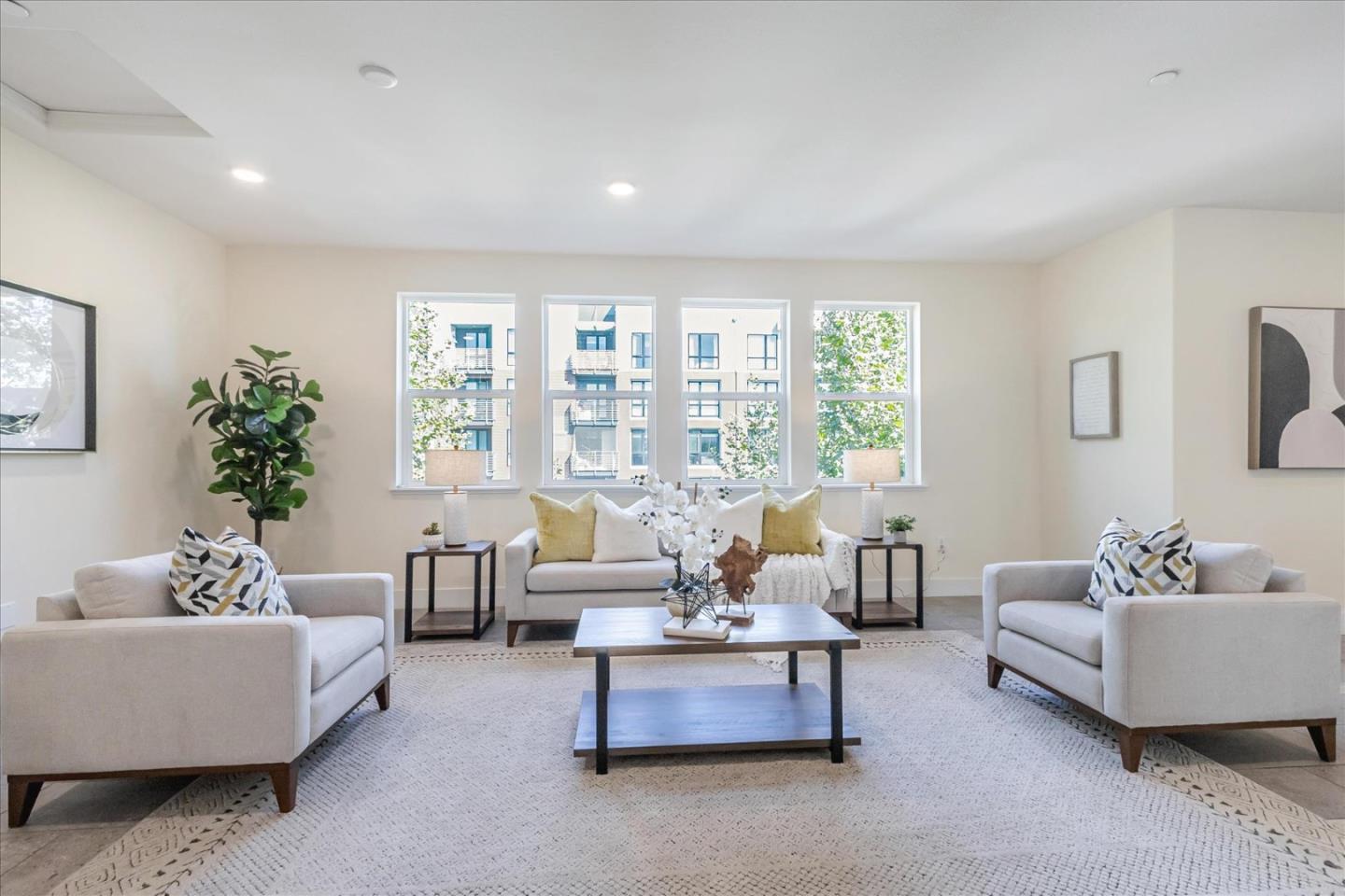 1653 Centre Pointe Drive Milpitas, CA 95035 - Photo 3 of 40 a living room with furniture and a large window