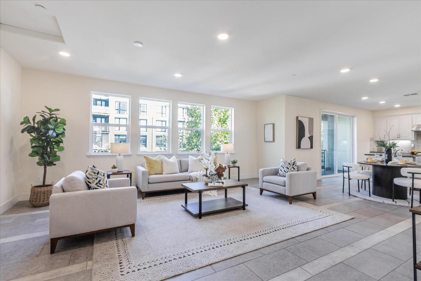 1653 Centre Pointe Drive Milpitas, CA 95035 - Photo 4 of 40 a living room with furniture and a large window