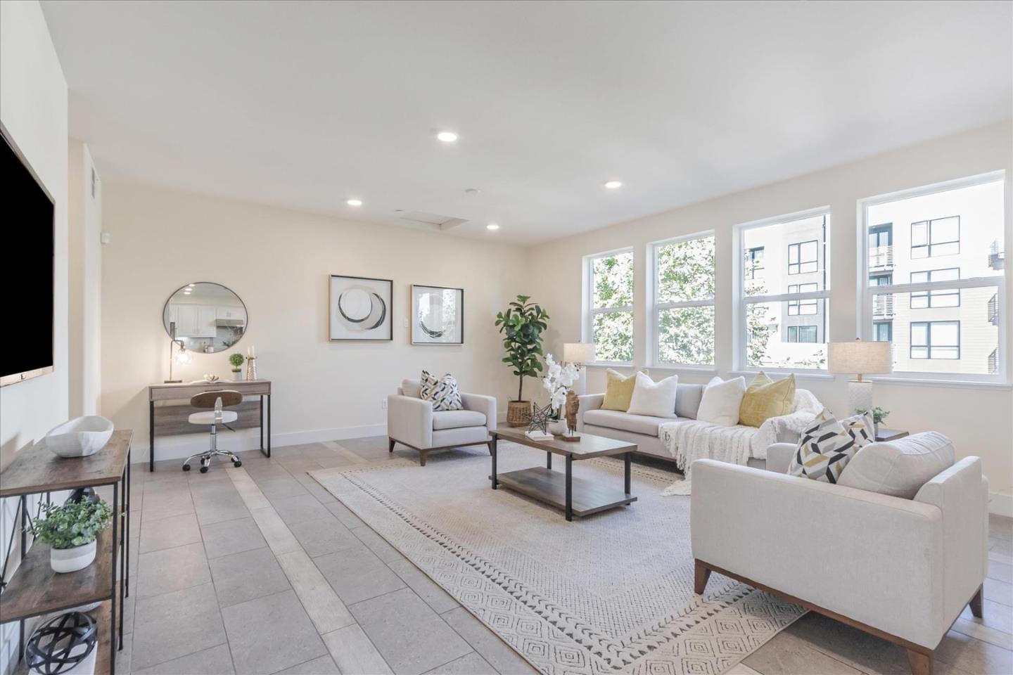 1653 Centre Pointe Drive Milpitas, CA 95035 - Photo 6 of 40 a living room with furniture and wooden floor