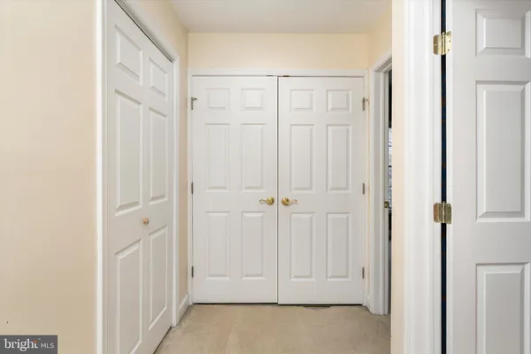 a view of storage and utility room with washer and dryer