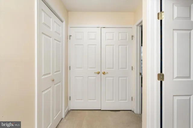 a view of storage and utility room with washer and dryer