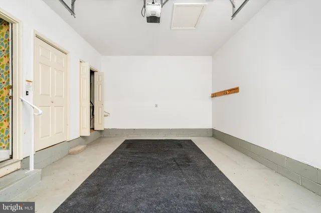 a view of a house with a snow on the road