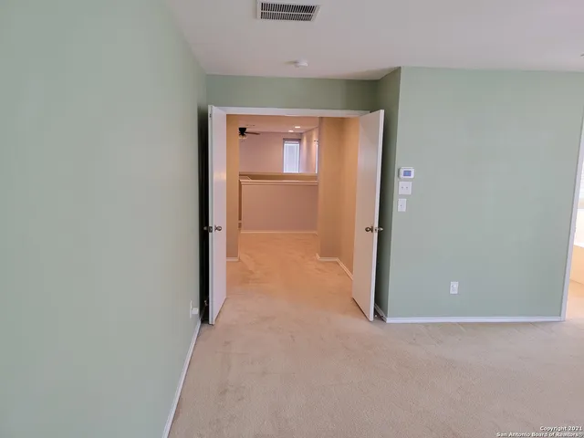 a bathroom with a tub and a shower