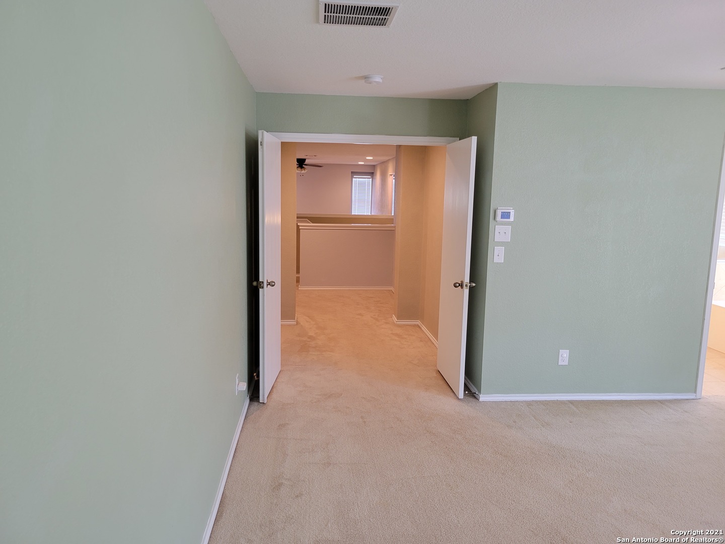 10919 Fox Crest Live Oak, TX 78233 - Photo 14 of 19 a view of a big room with closet and windows