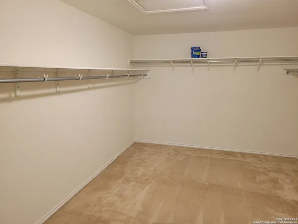 a view of small space with racks on the wall
