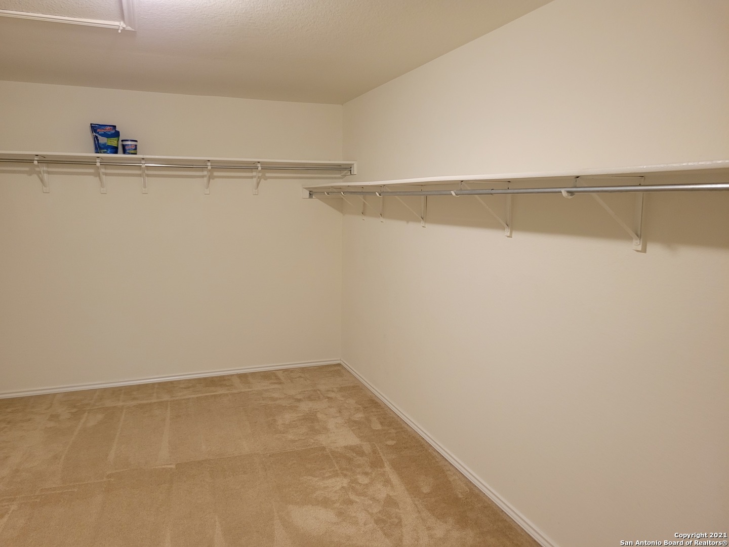 10919 Fox Crest Live Oak, TX 78233 - Photo 18 of 19 a view of small space with racks on the wall