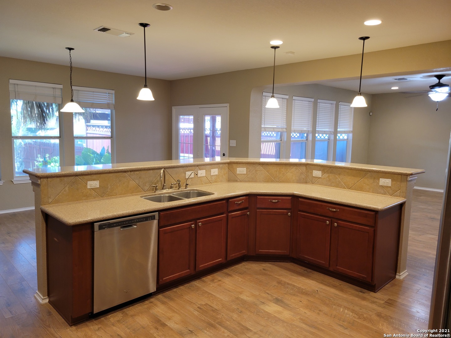 10919 Fox Crest Live Oak, TX 78233 - Photo 6 of 19 a kitchen with a sink and window
