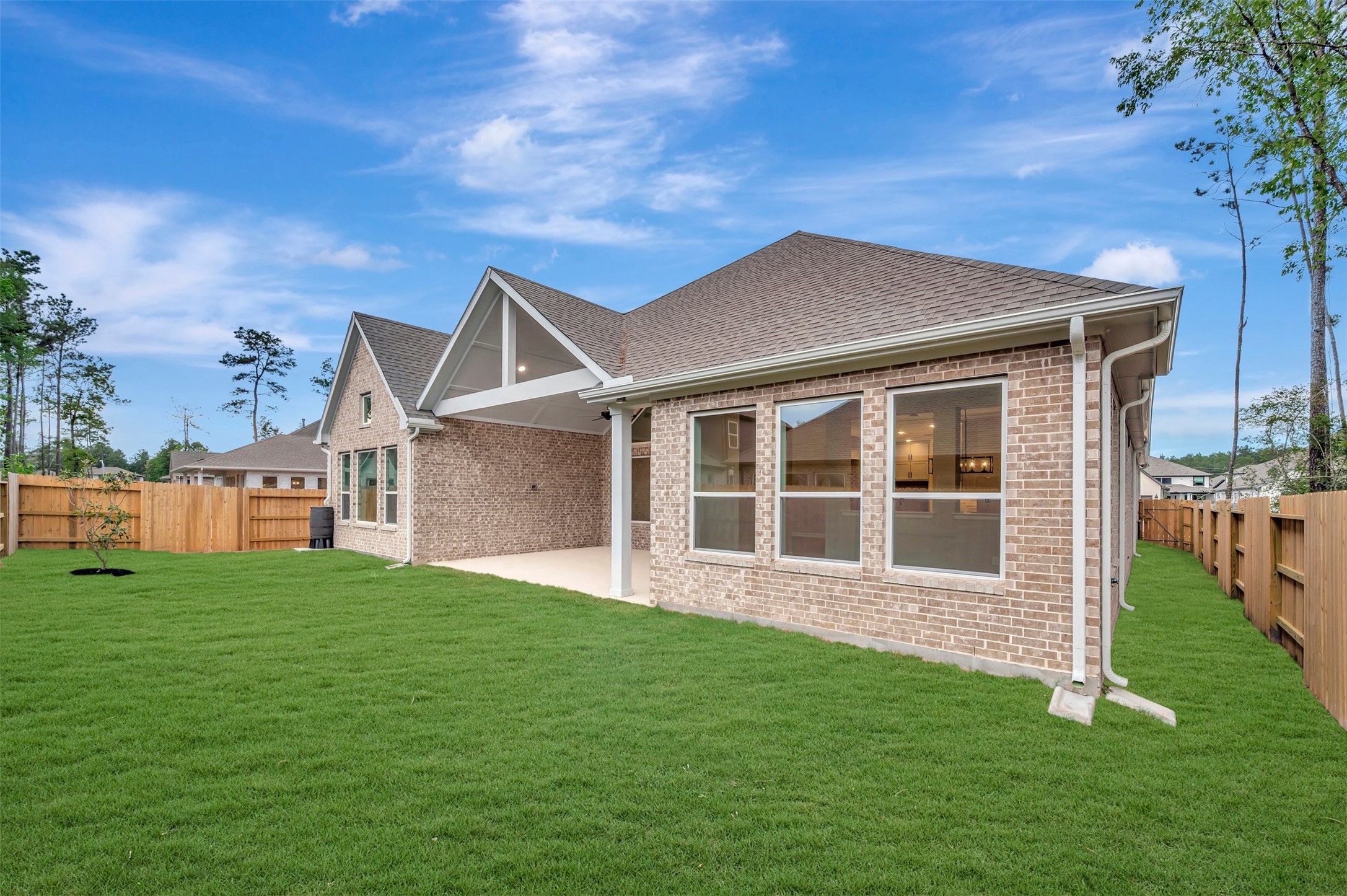 15722 Terracotta Terrace Conroe, TX 77302 - Photo 10 of 50 a view of a house with a yard