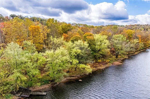 a view of a lake from a yard