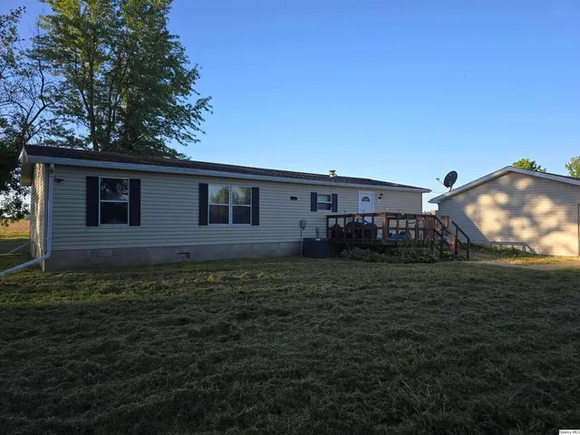 a house view with a garden space