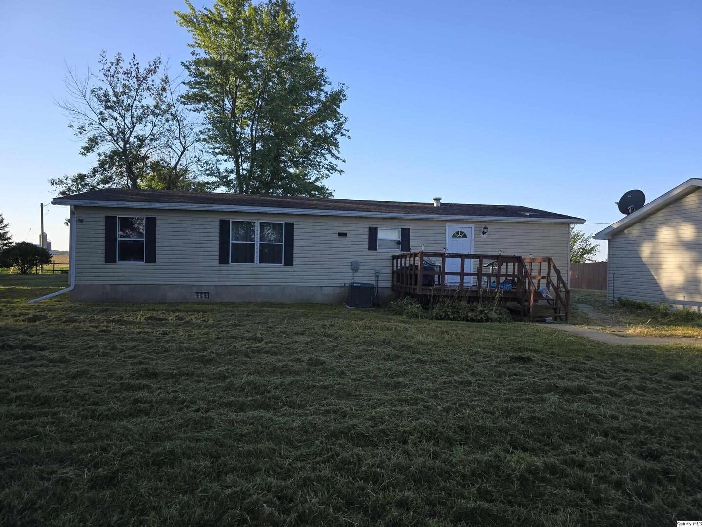 1103 East Main Augusta, IL 62311 - Photo 24 of 27 a view of a house with a yard