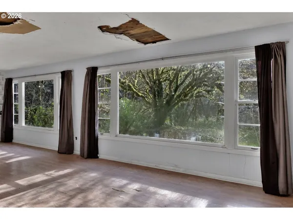 a view of a room that has a window